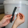 Pojemnik do fermentacji piwa z rurką fermentacyjną, kranikiem, termometrem i reduktorem osadu