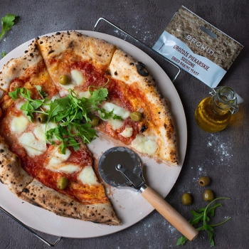 Kamień do pizzy z uchwytem i nożykiem, z kordierytu, okrągły 33 cm
